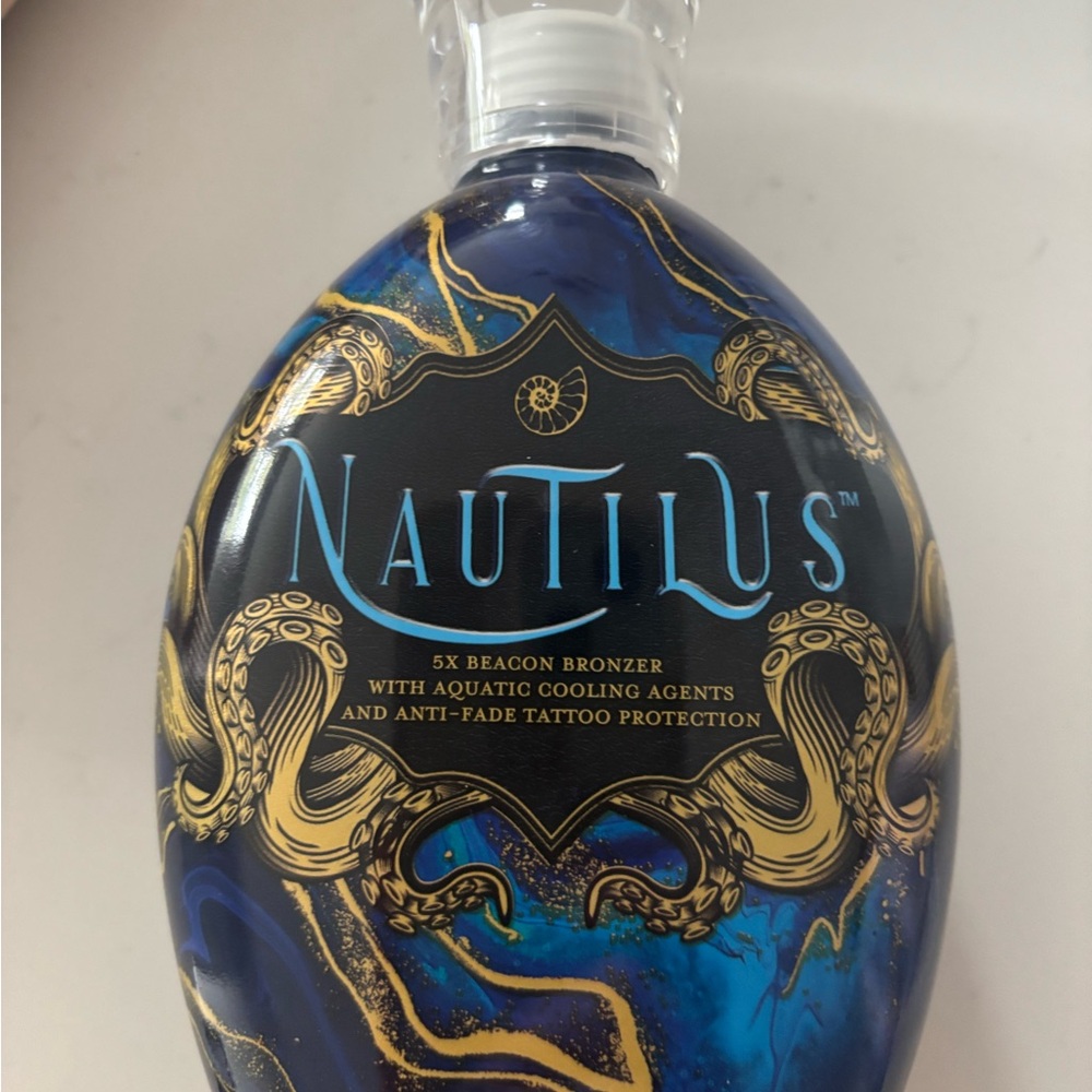 Nautilus Blue and Gold Suncare Bronzer